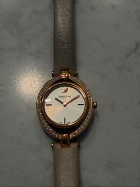 Swarovski Rose Gold Watch with Taupe Strap